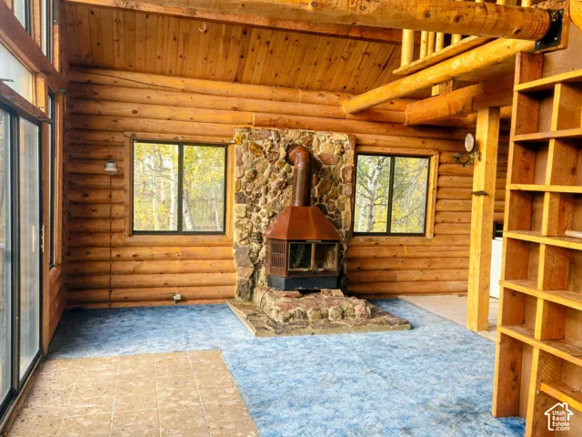 Log wall construction and exposed wood beams