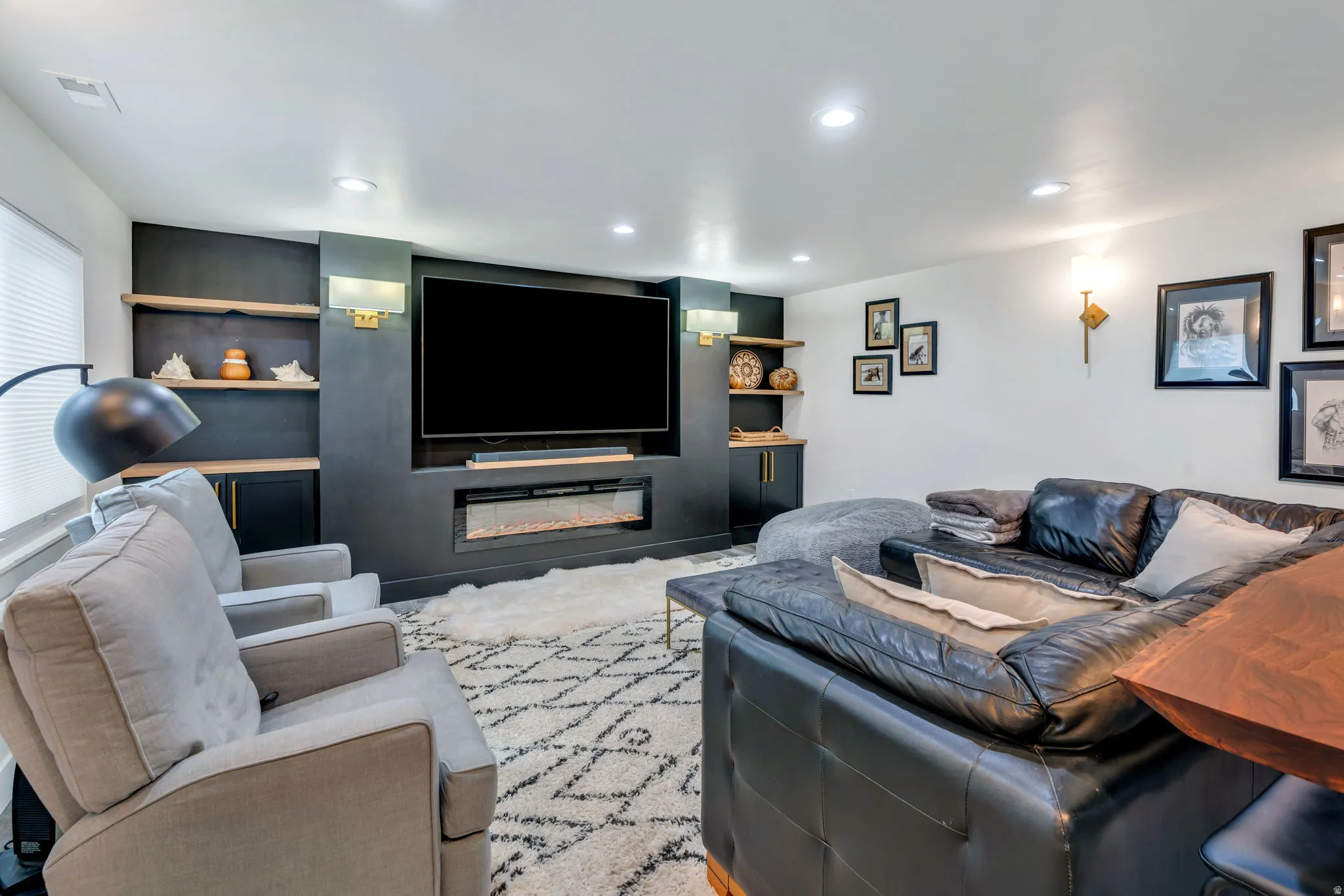 Built-in media center/family room and an electric fireplace