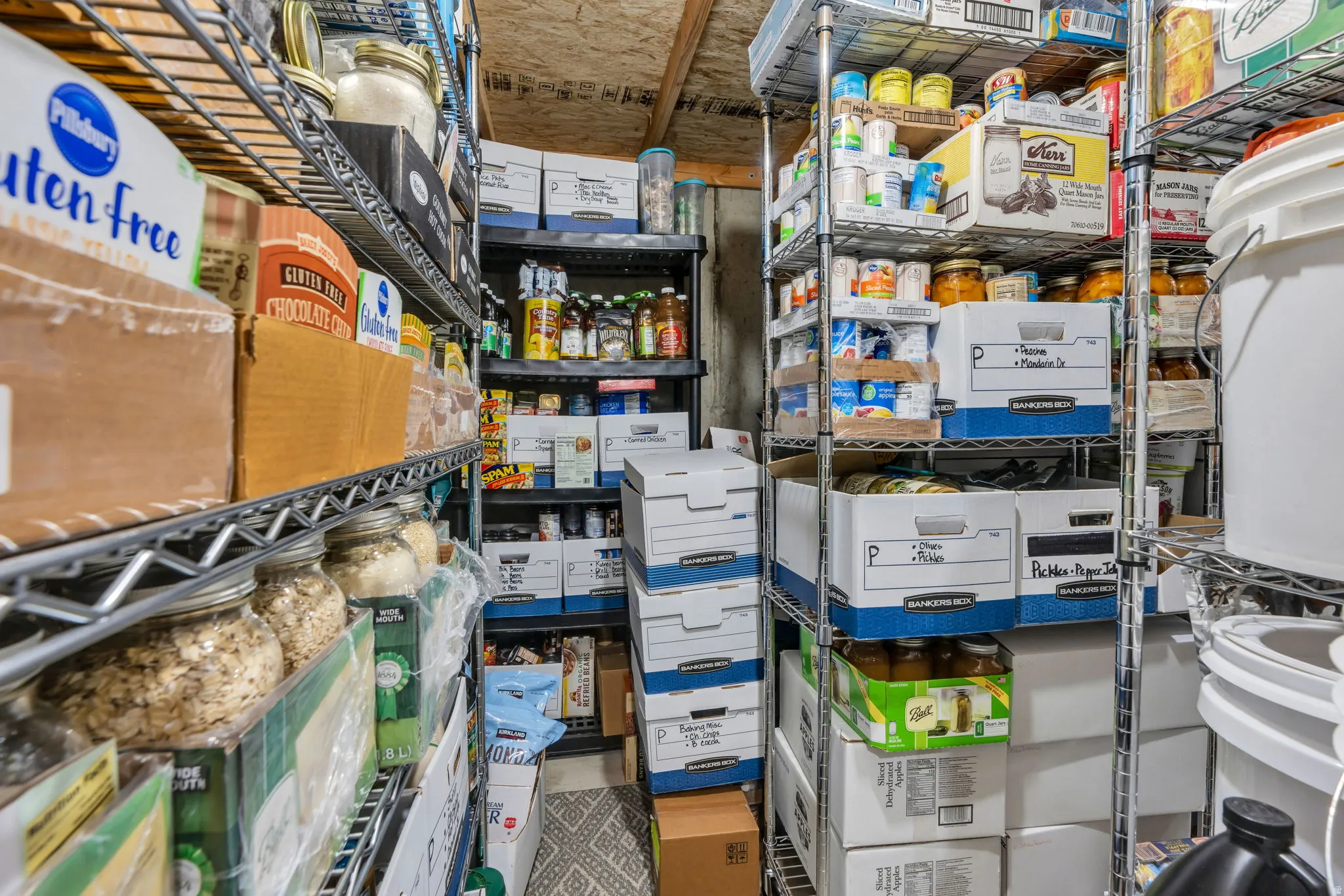 Utility room featuring abundant shelving units