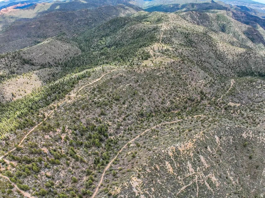 Expansive mountainous terrain with varied elevations and natural foliage