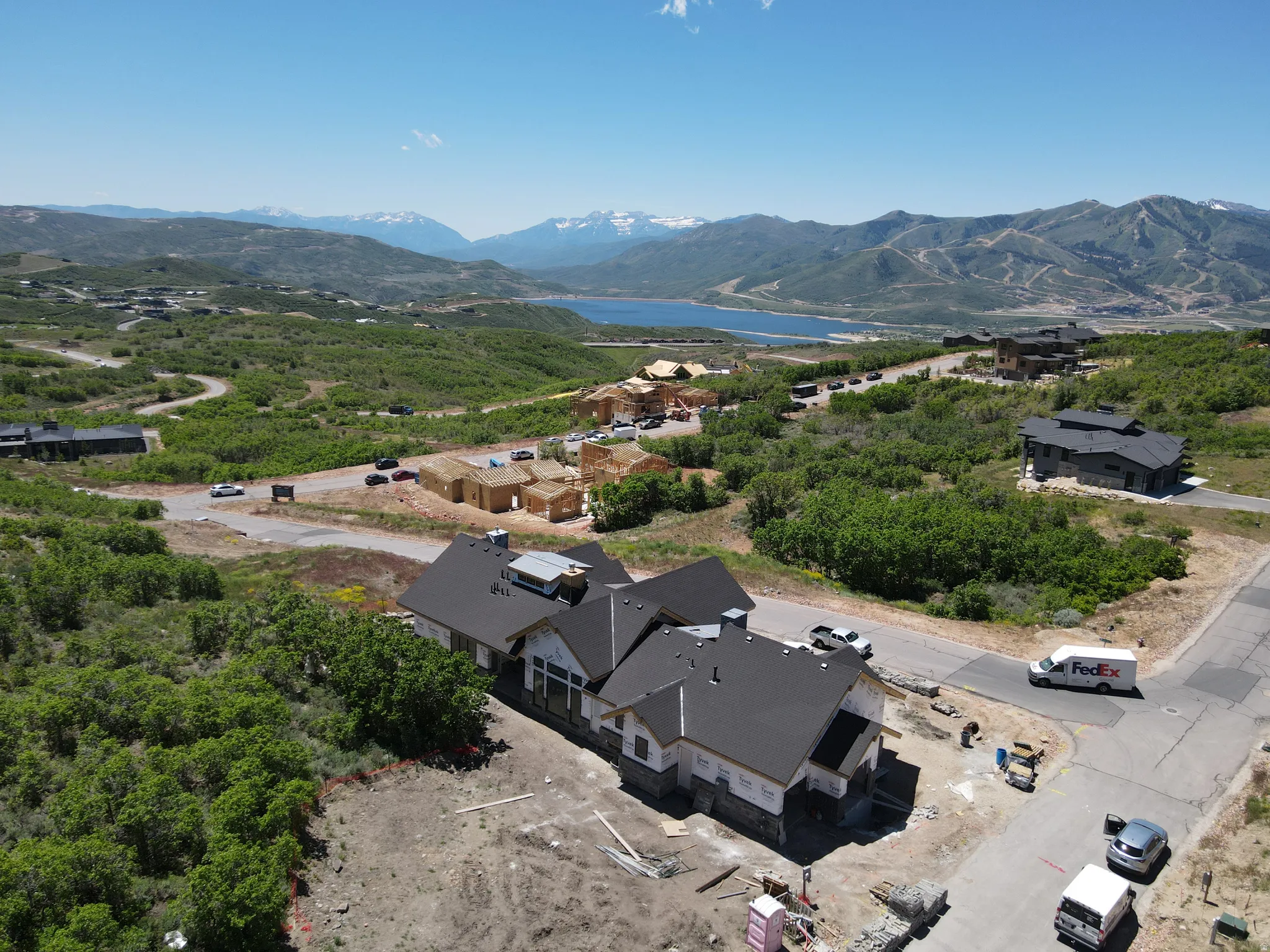 Bird's eye view above the home featuring a mountain backdrop