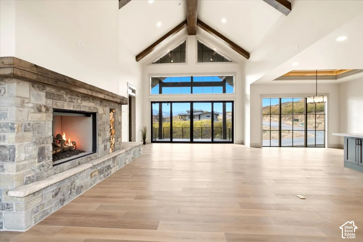Spacious living space featuring vaulted ceilings