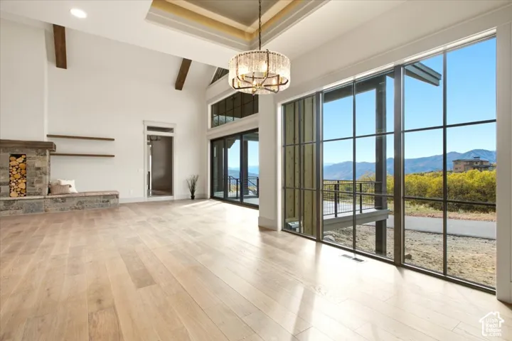 Dining area featuring floor-to-ceiling windows with mountain scenery