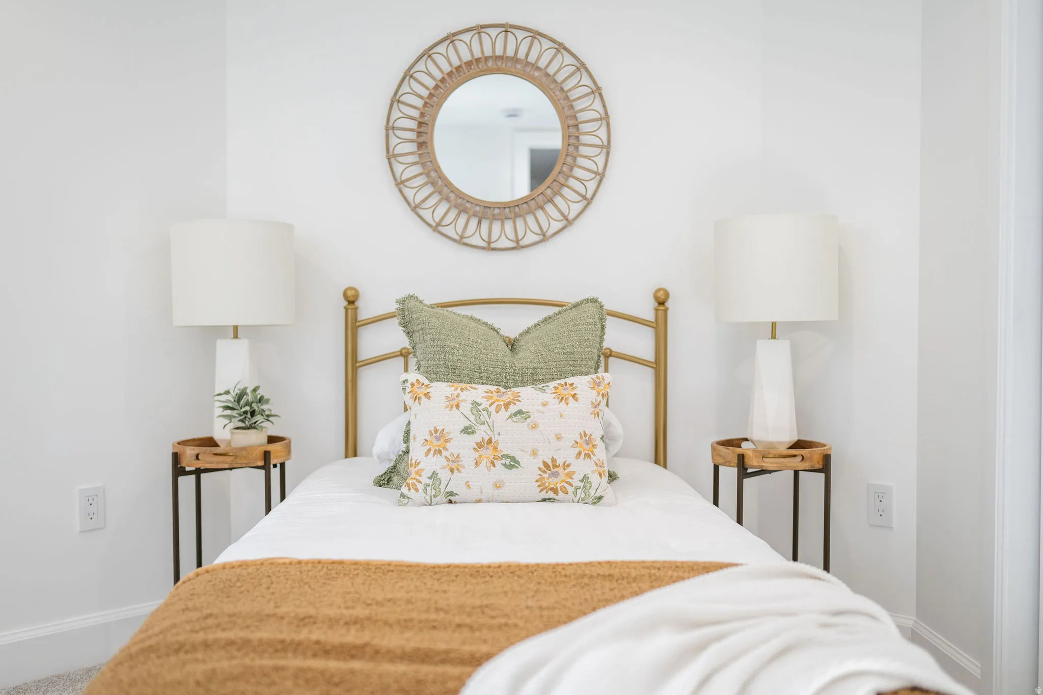 White wall finishes, recessed lighting, and a neutral color palette