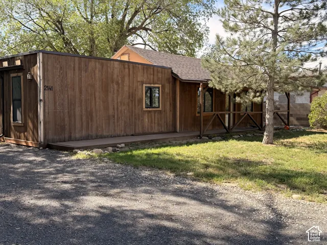 Wood-clad exterior with dark trim windows