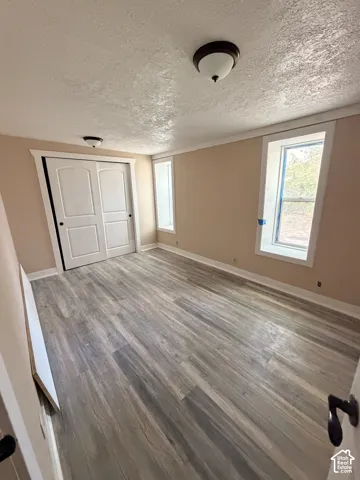 Wood-finish flooring with neutral wall tones
