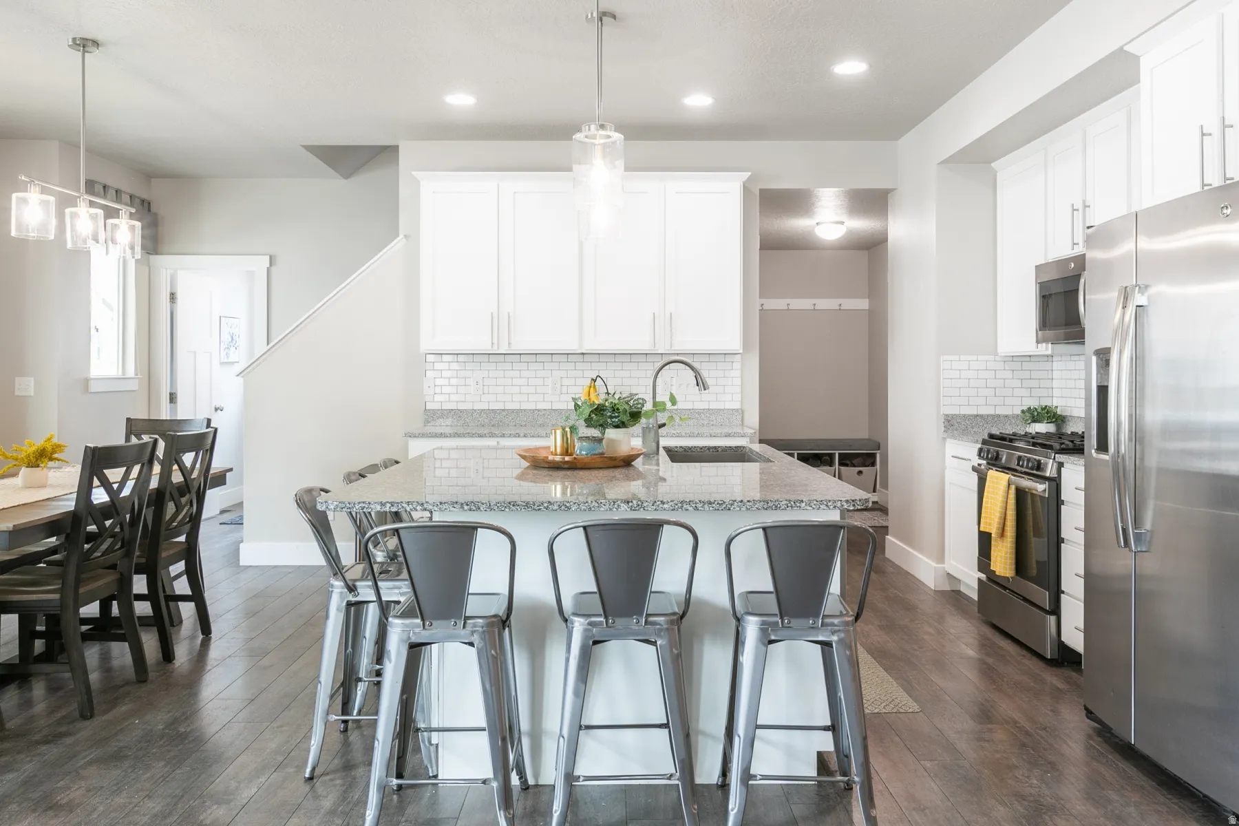 Kitchen island with granite countertop and undermount sink