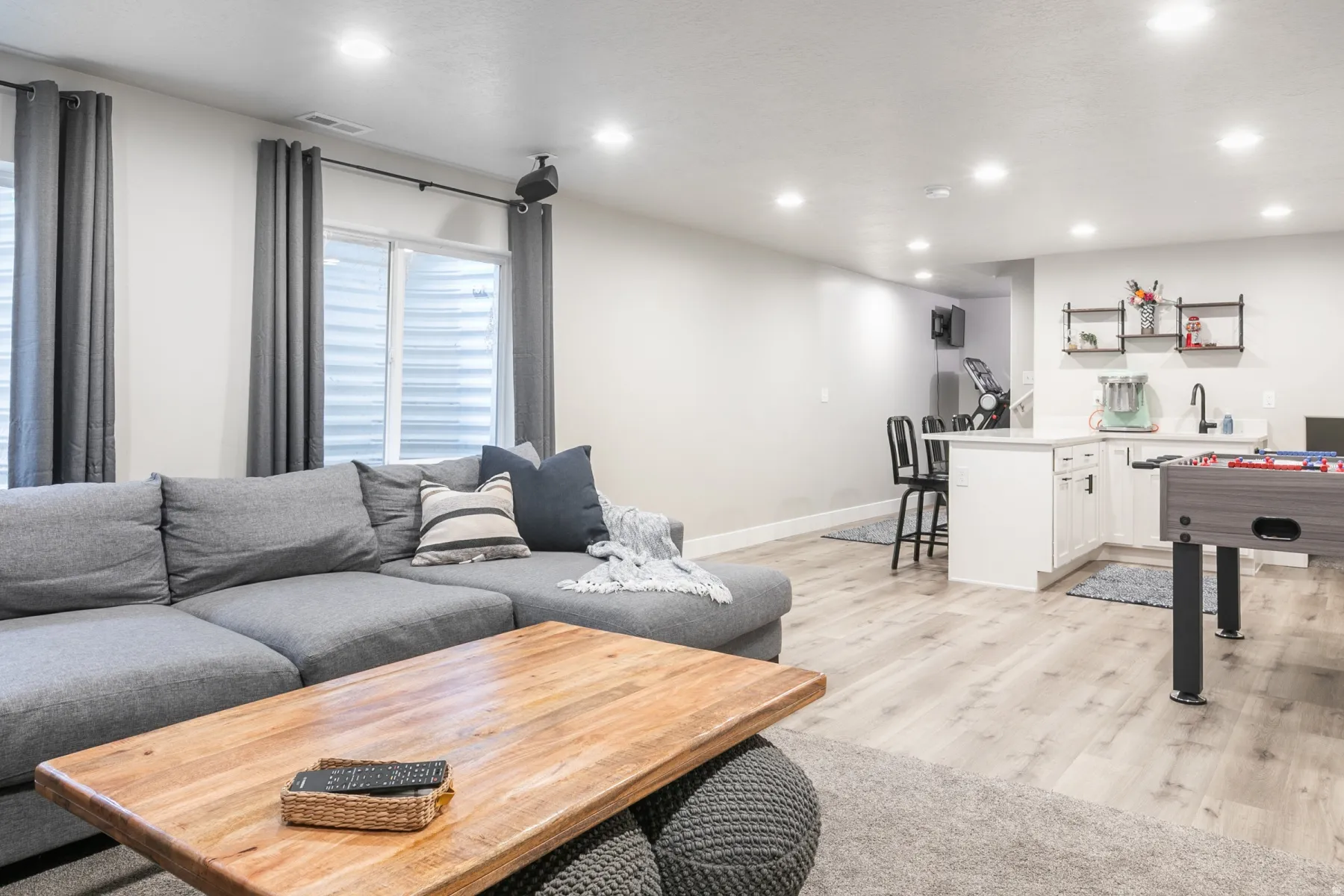 Spacious lower-level area featuring recessed lighting and light wood-finish flooring