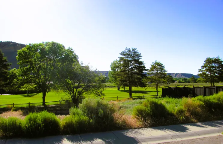 Back of property view of golf course.