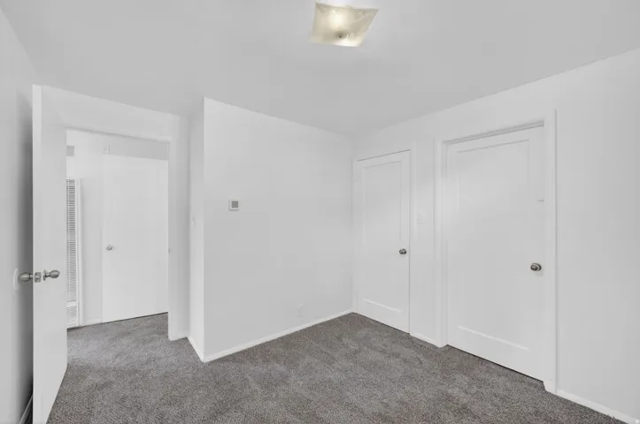 Neutral white walls with matching trim