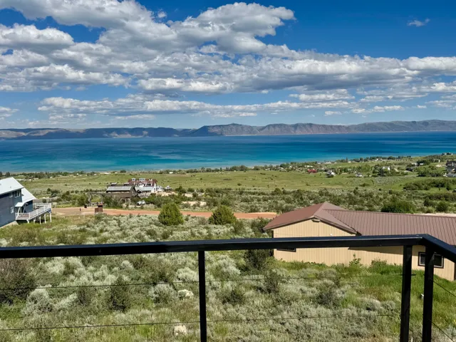 Expansive water and mountain scenery from an elevated perspective