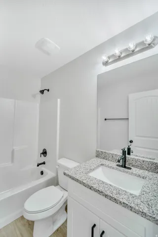 Photos are of a previously built home of the same floor plan. Finishes, colors, features, and upgrades may vary. Bathroom
