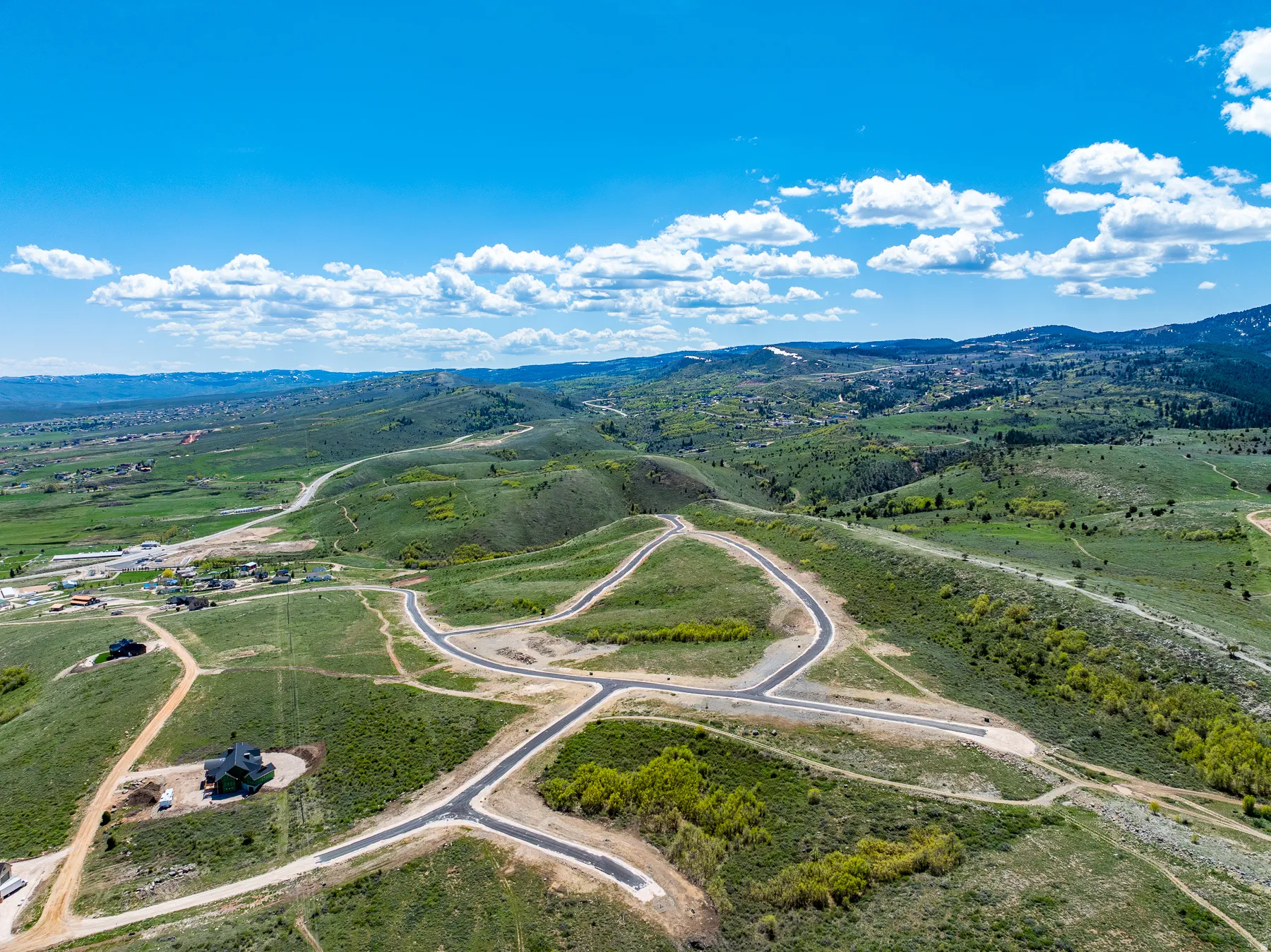 Expansive development featuring paved roads and gentle slopes