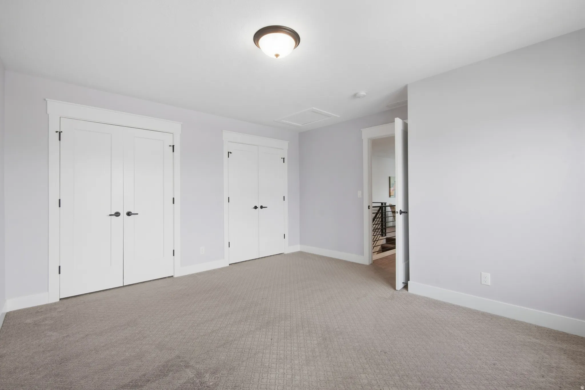 Bedroom 4 Neutral wall color complemented by white trim