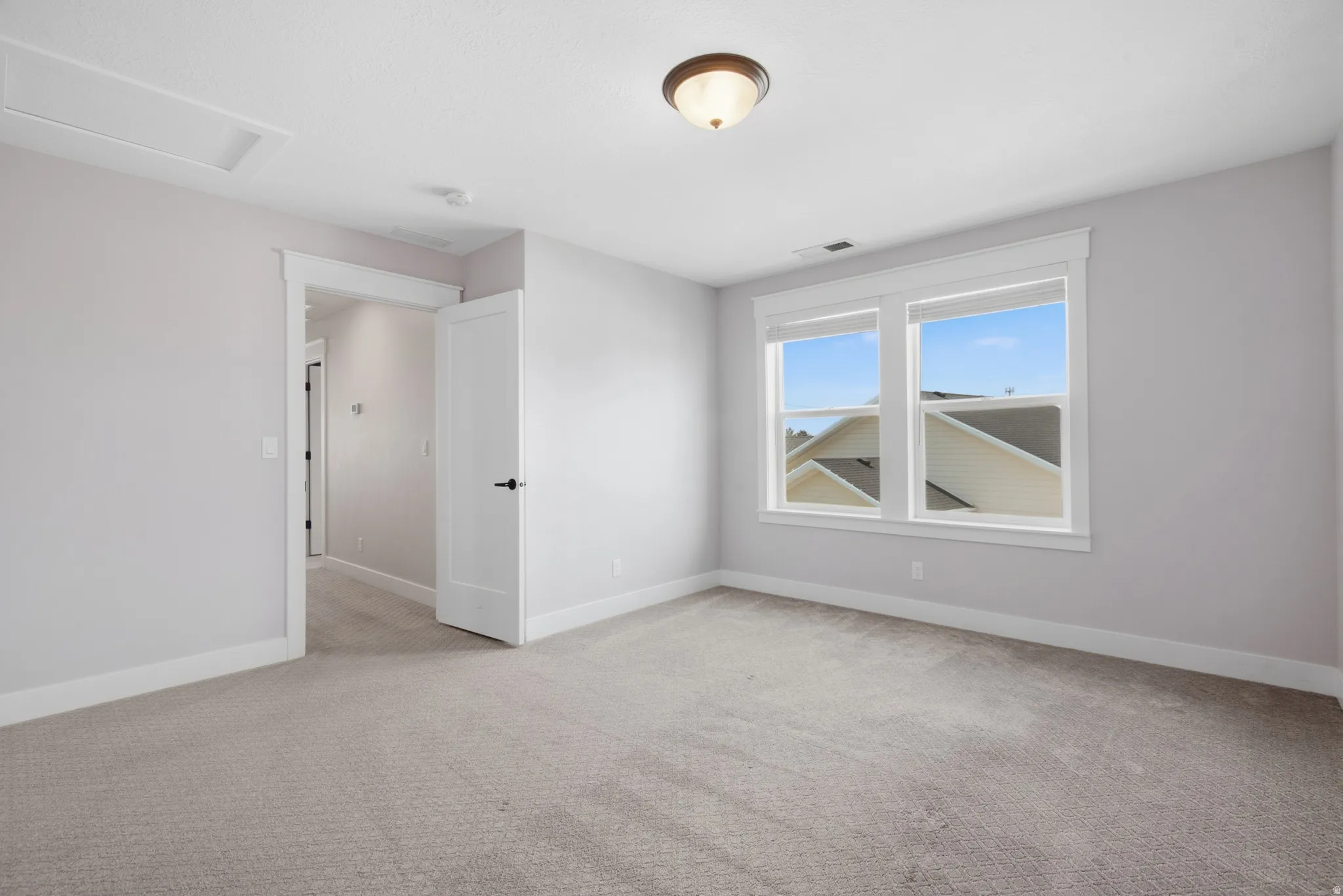 Bedroom 4 Recessed lighting, light gray carpet, and white trim