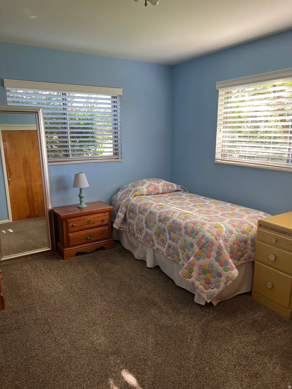 Neutral toned carpeting throughout