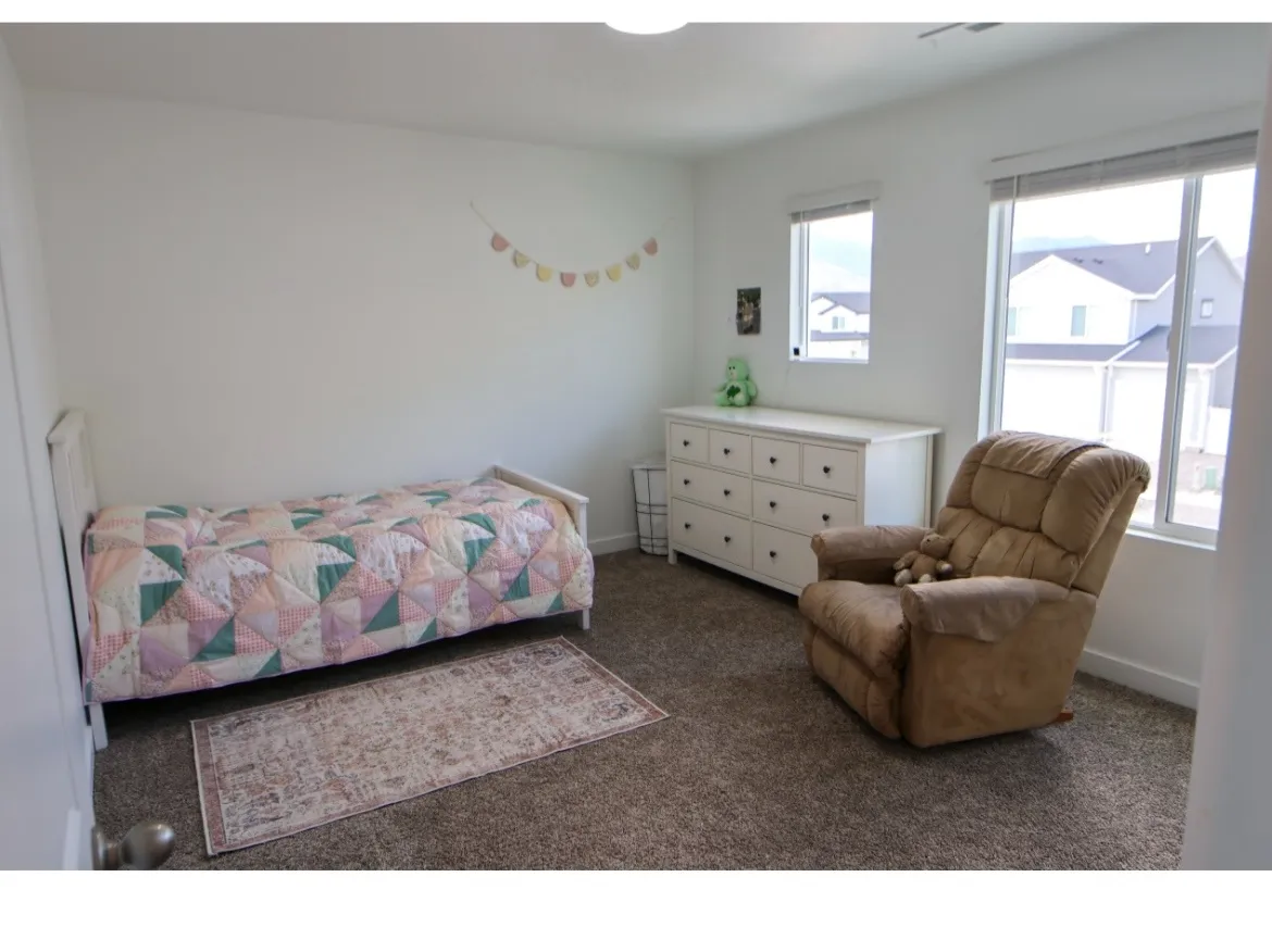 Bedroom #2 with multiple windows for extra natural light.