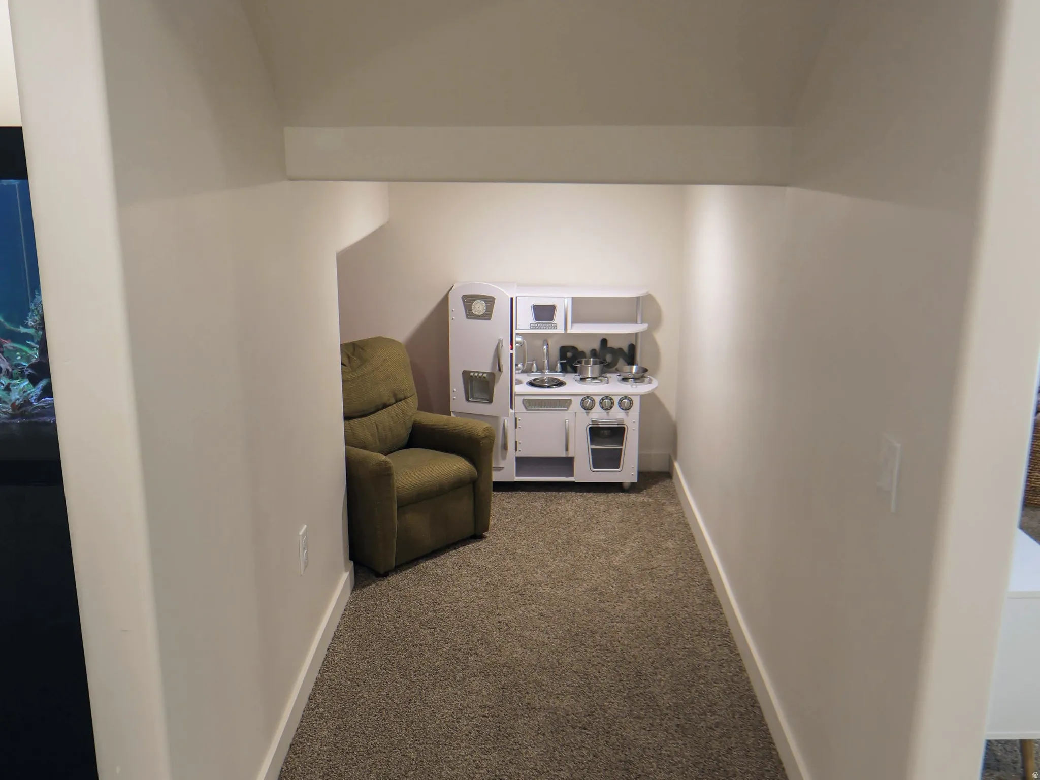 Toy area under stairs