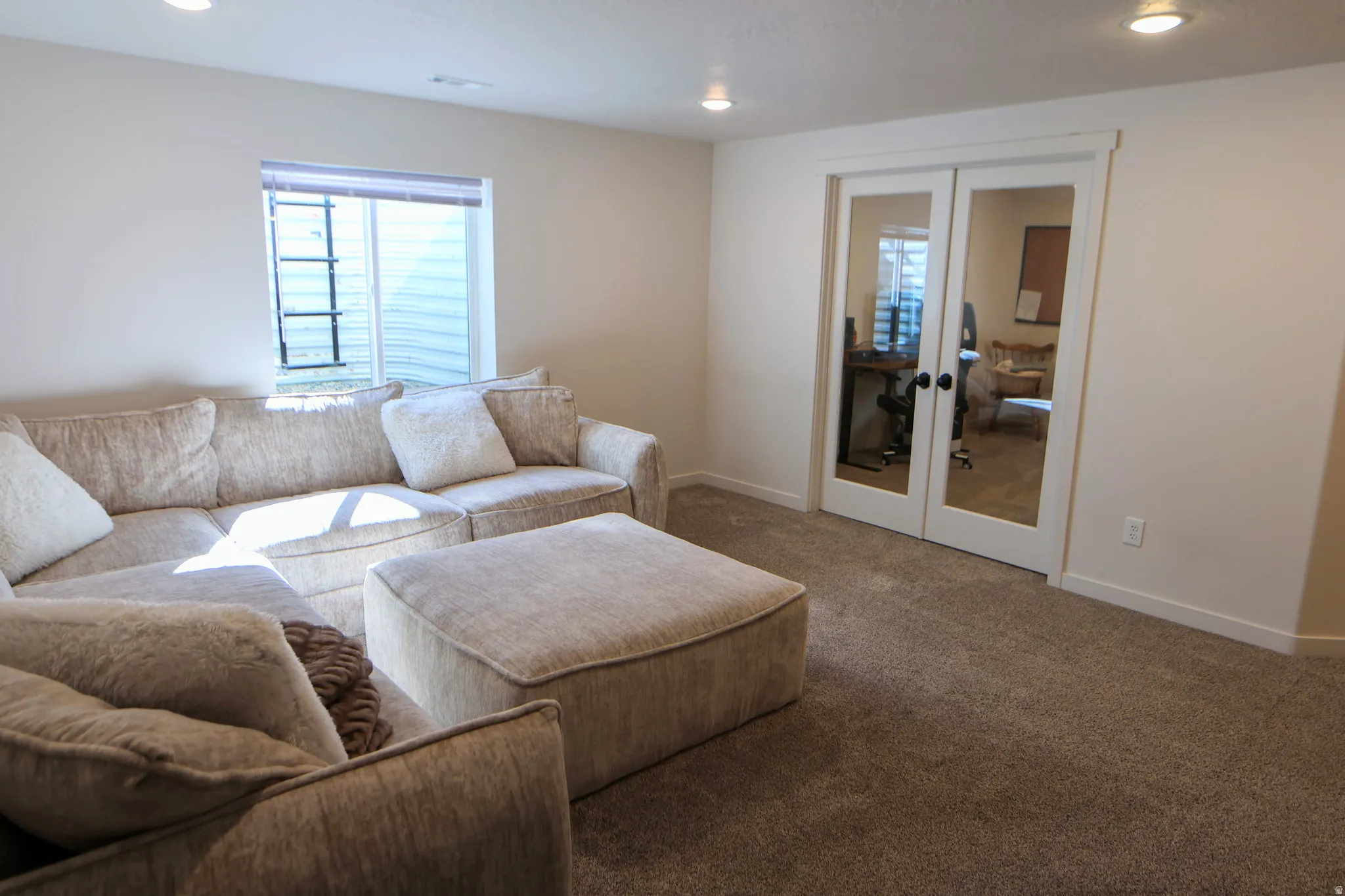 Basement living room area.