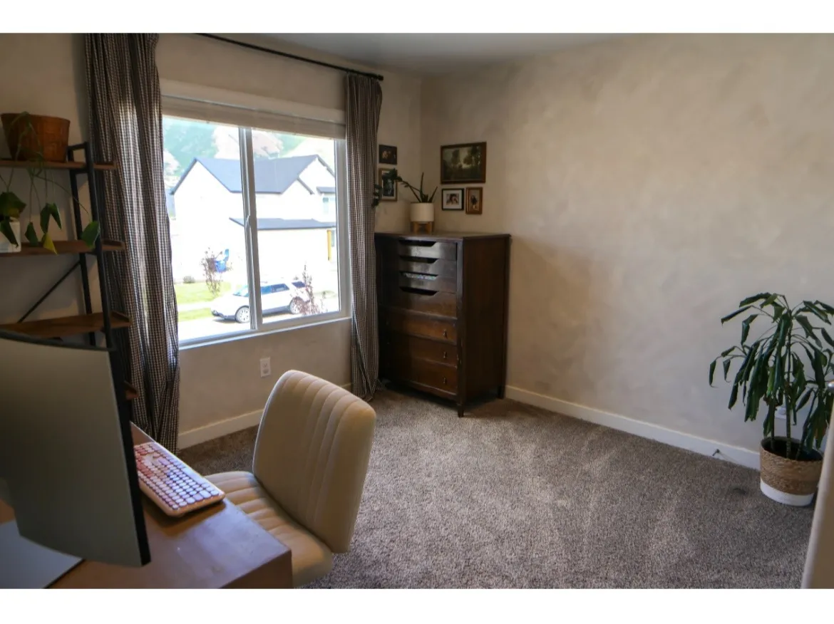 Bedroom #3/office with large window.