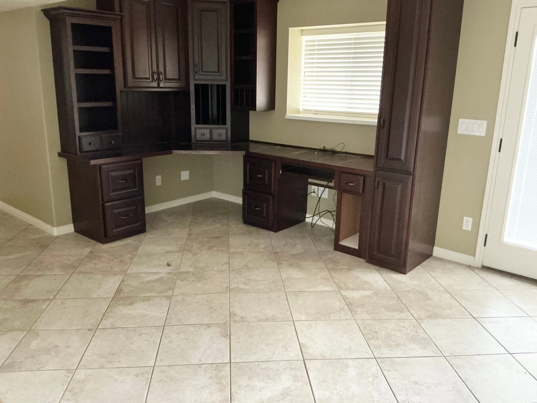 BASEMENT FAMILY ROOM WITH CABINETS