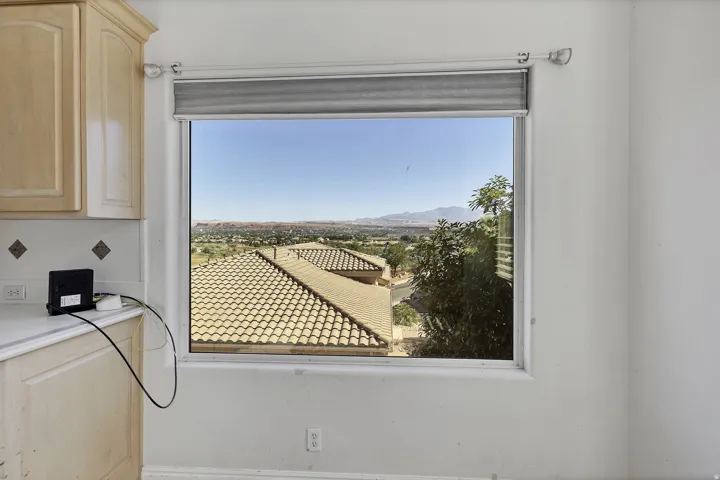 Expansive window offering a distant horizon