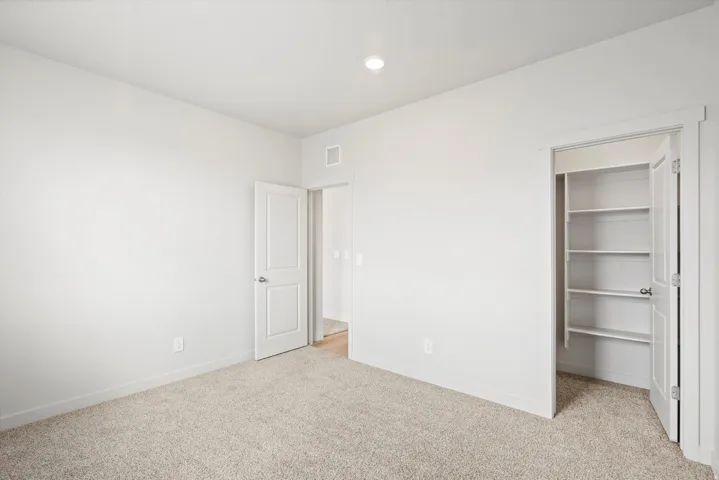 **DISLCAIMER** Interior package may vary. Neutral tone wall color with light-colored carpeting