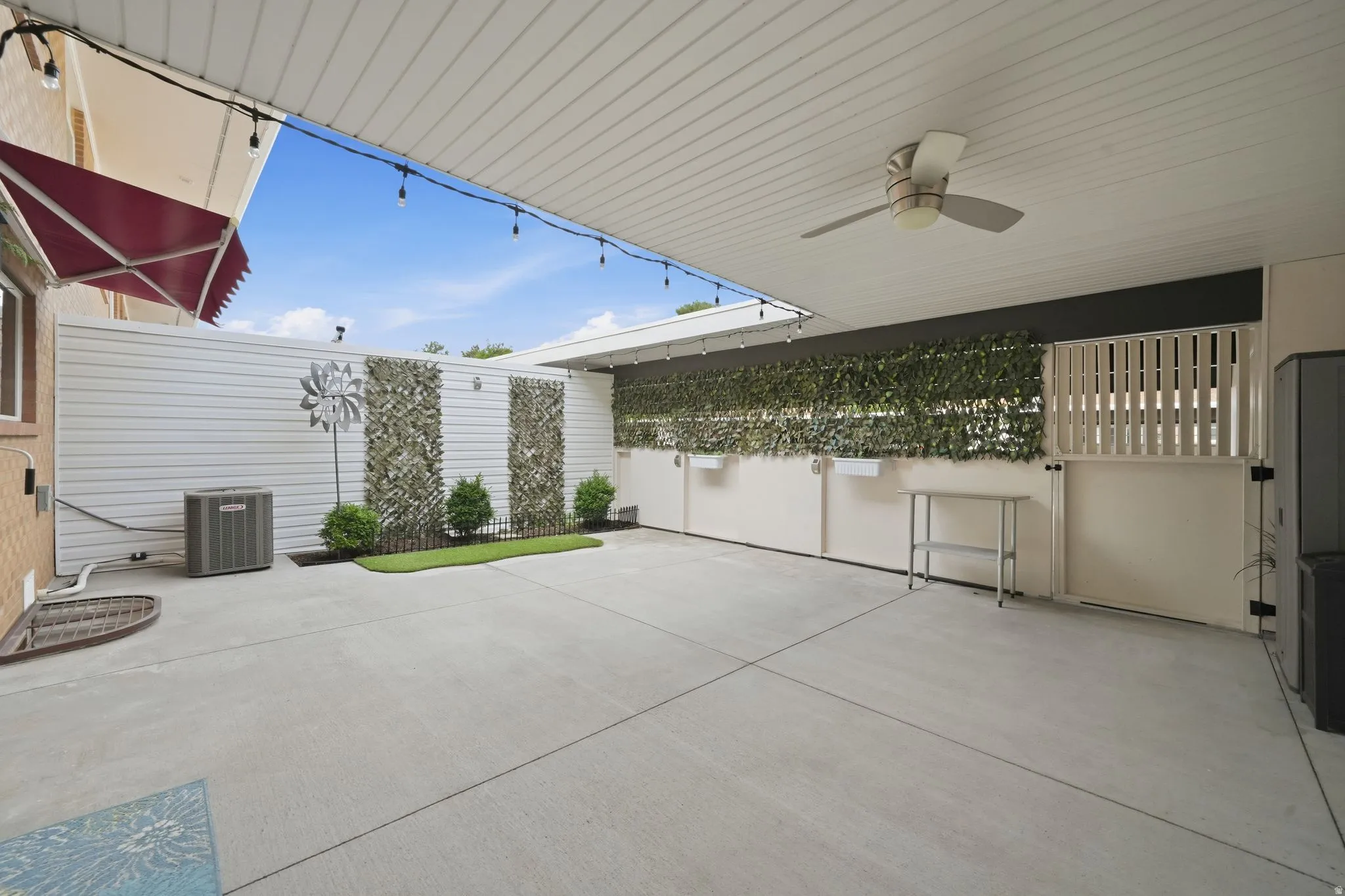 Private fenced backyard area/ patio connected to 3 car carport