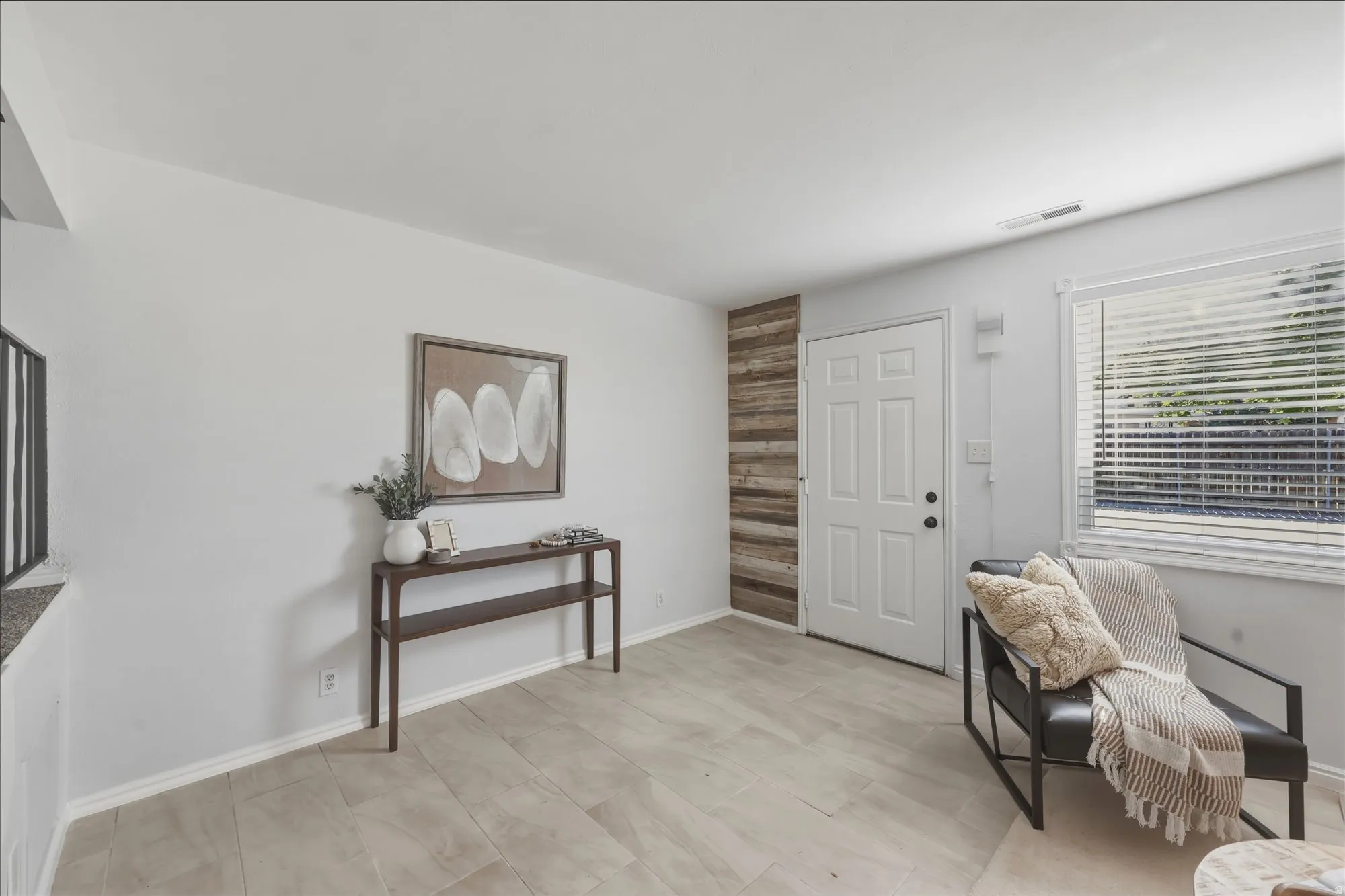 Light-toned tile flooring throughout