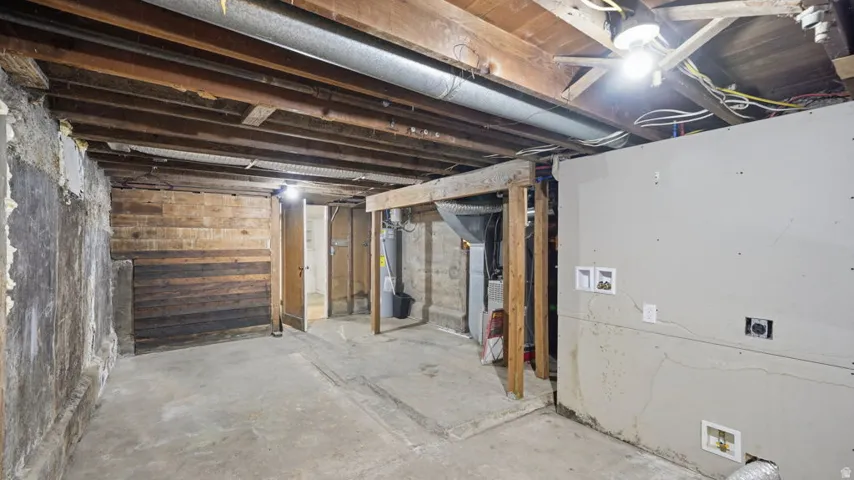 Concrete flooring with exposed wooden ceiling joists