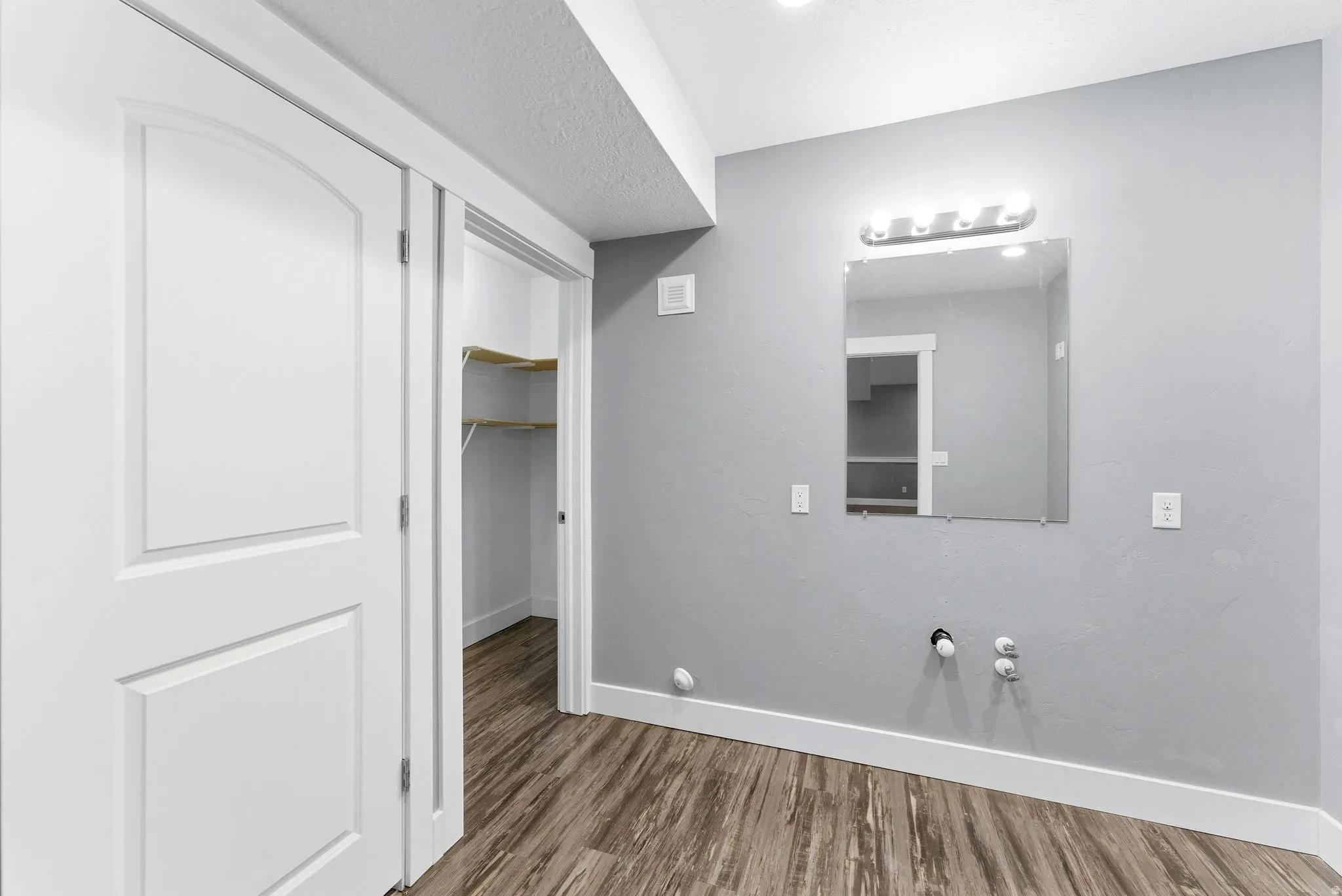 Versatile flex space with plumbing already in place—ideal for a home office, hobby room, beverage station, creative workspace, or customized to fit your lifestyle.