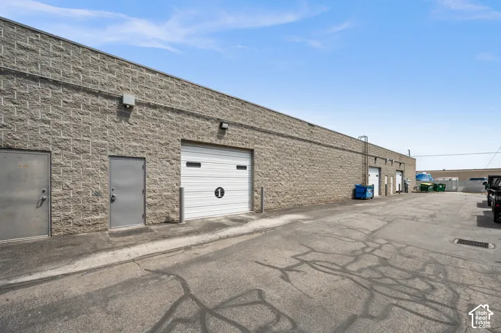 Industrial building exterior featuring a textured block facade