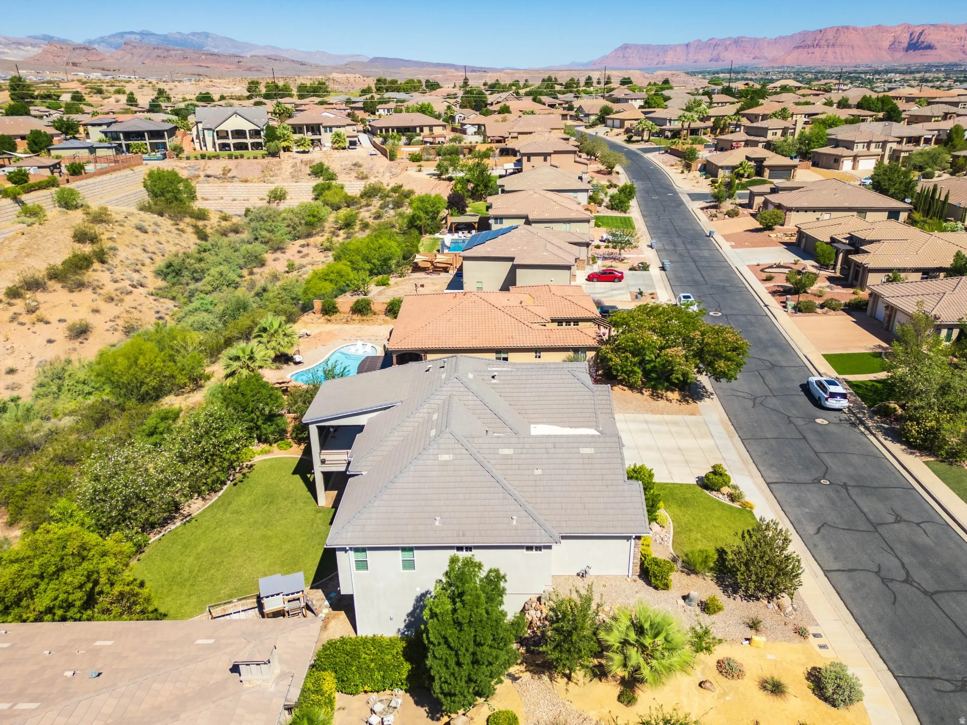 Aerial perspective showcasing a residential street with diverse architectural styles