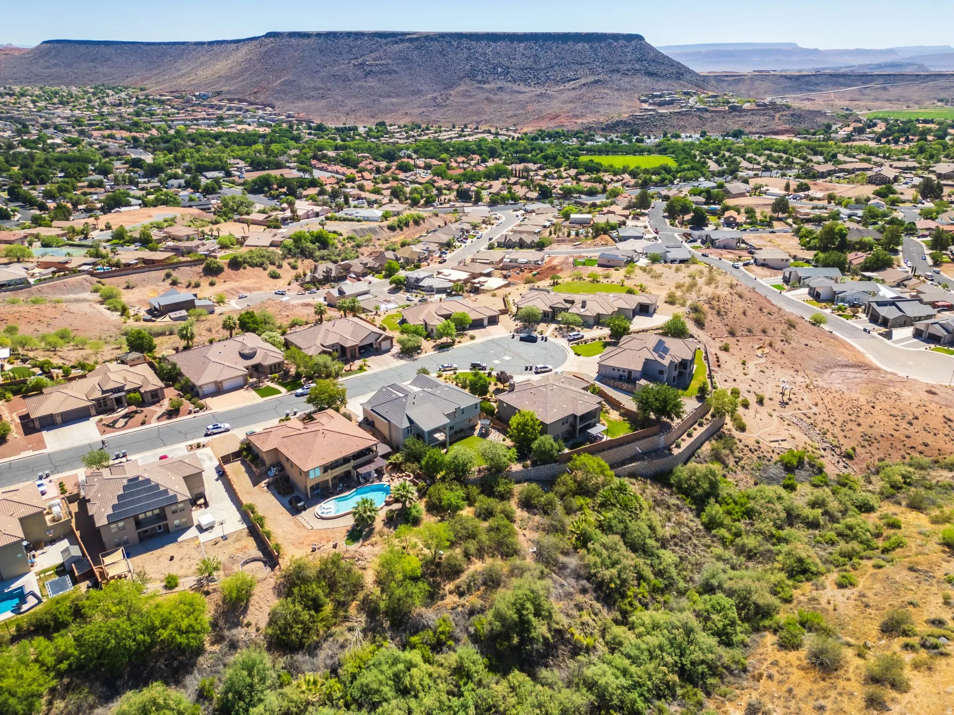 Residential neighborhood featuring varied architectural styles and mature landscaping