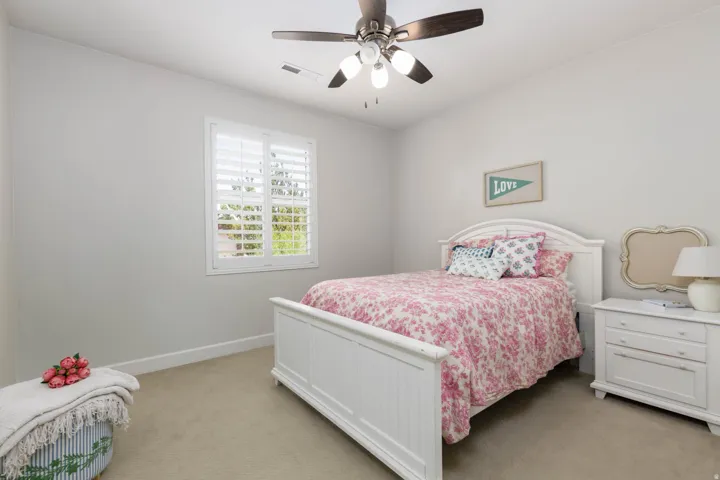 Neutral wall tones with carpeted flooring