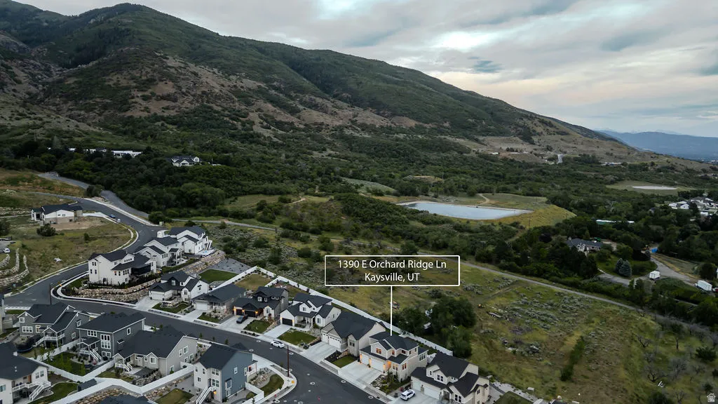 Aerial perspective highlighting a residential development with mountain backdrop