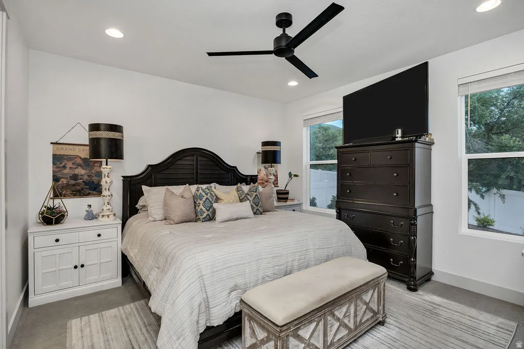 Bedroom featuring recessed lighting and a ceiling fan
