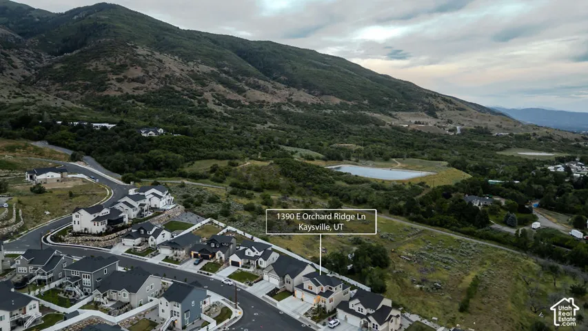 Aerial perspective highlighting a residential development with mountain backdrop