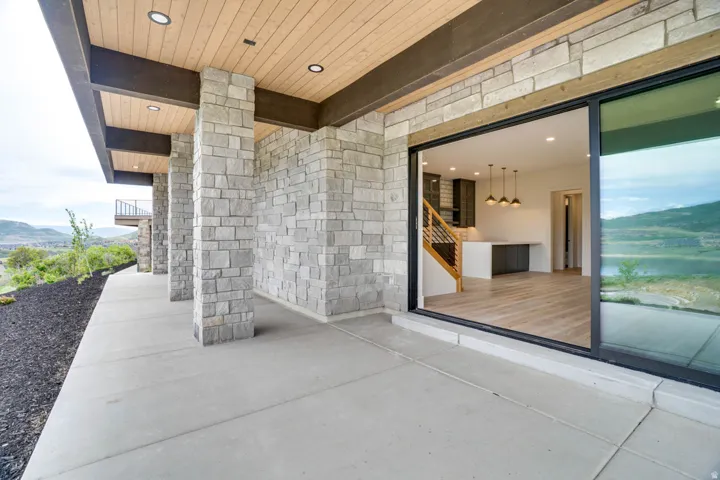 Expansive concrete patio offering outdoor living space