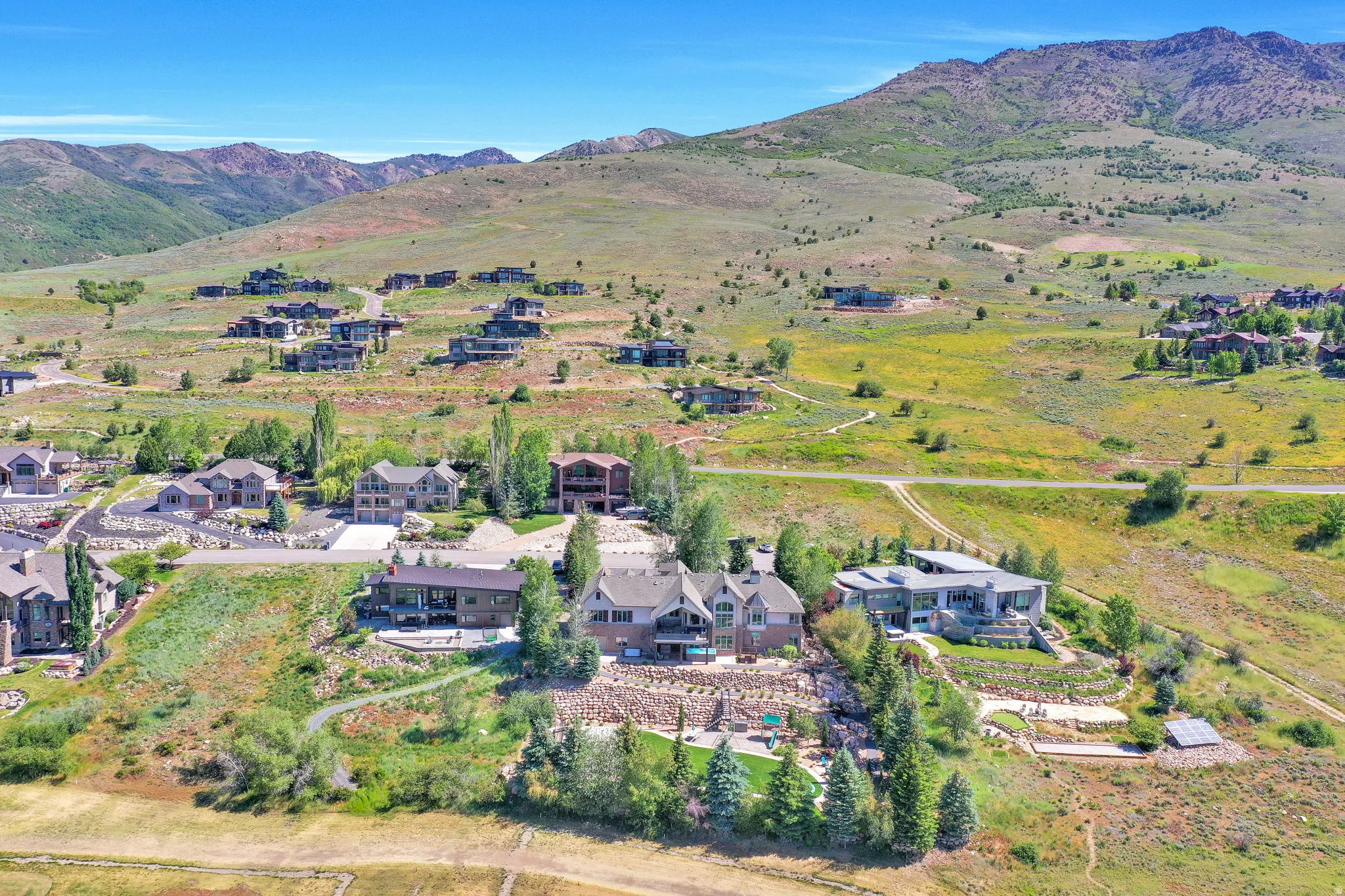 Expansive residential development nestled into a mountainous landscape