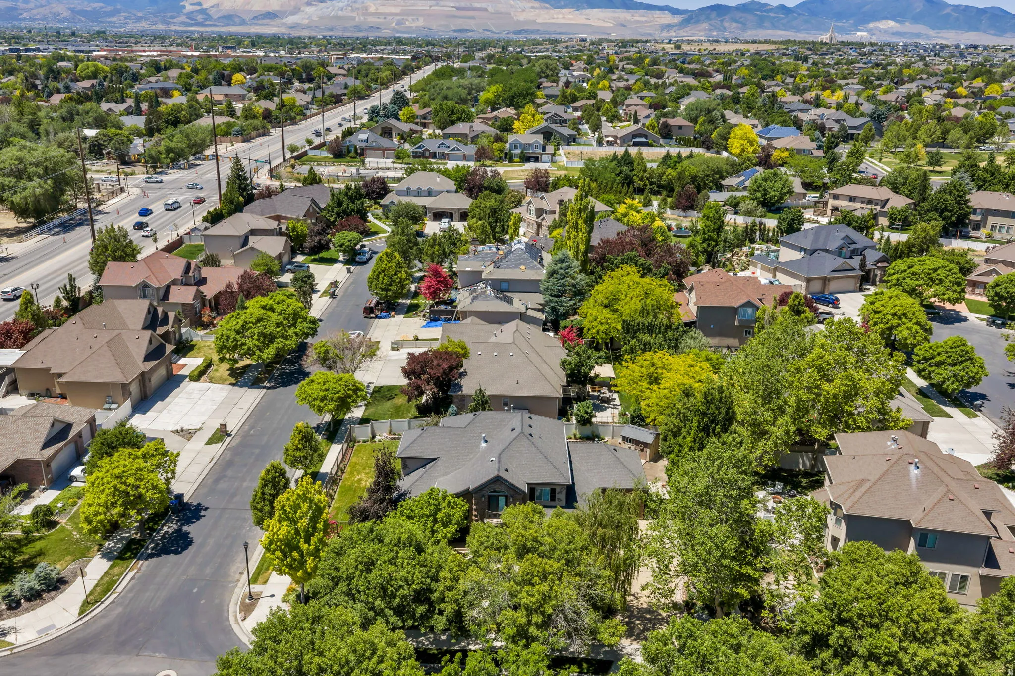 Expansive aerial capture showcasing a residential area with varied home architectural styles