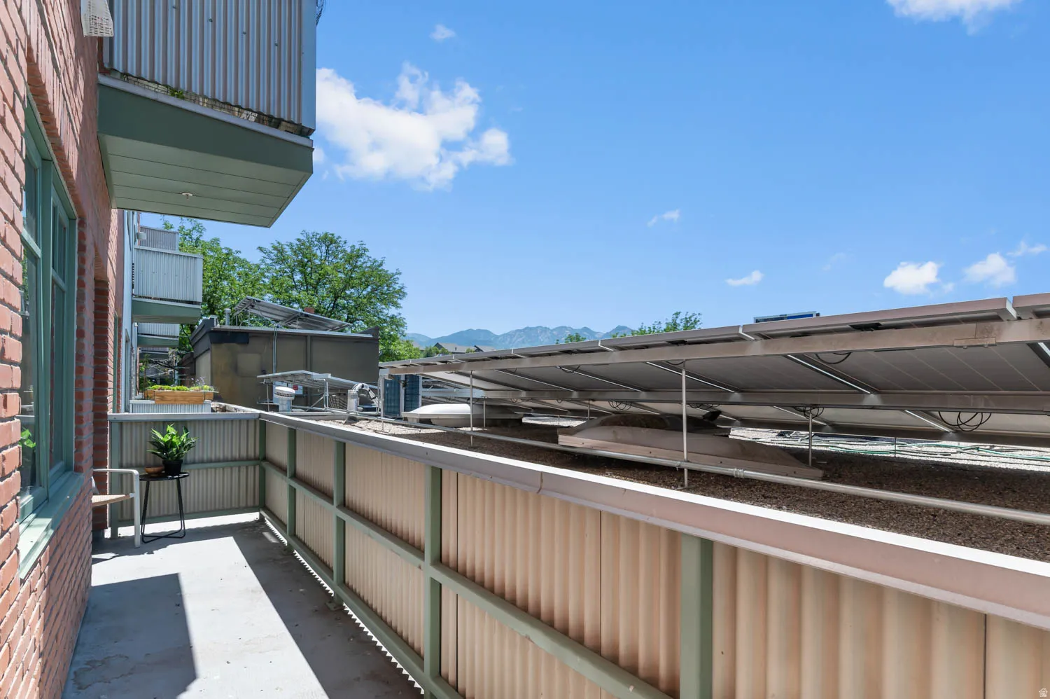 Outdoor balcony with concrete flooring