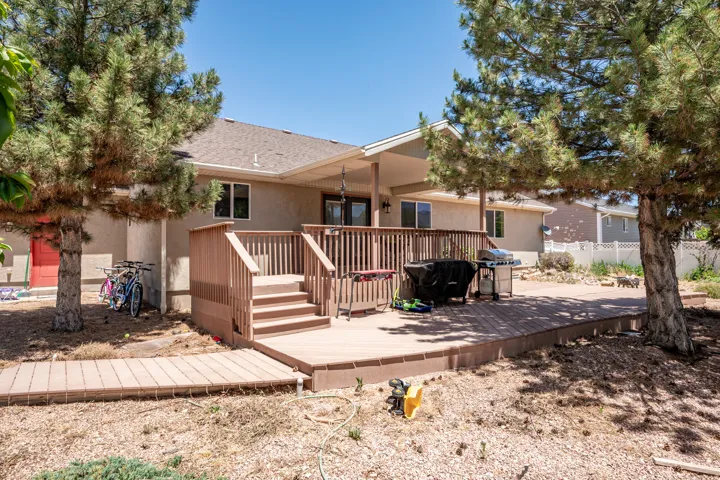 Spacious outdoor deck featuring a multi-level design and direct access to the interior