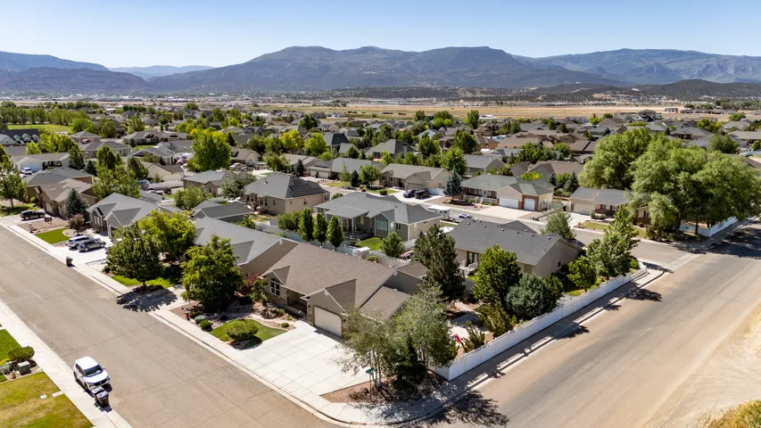 Expansive residential area featuring numerous single-story homes, mature landscaping, and paved streets