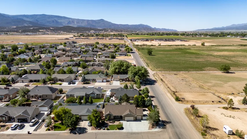 Residential development featuring single-story homes with attached garages