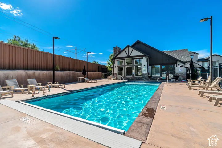 Outdoor swimming pool with concrete decking