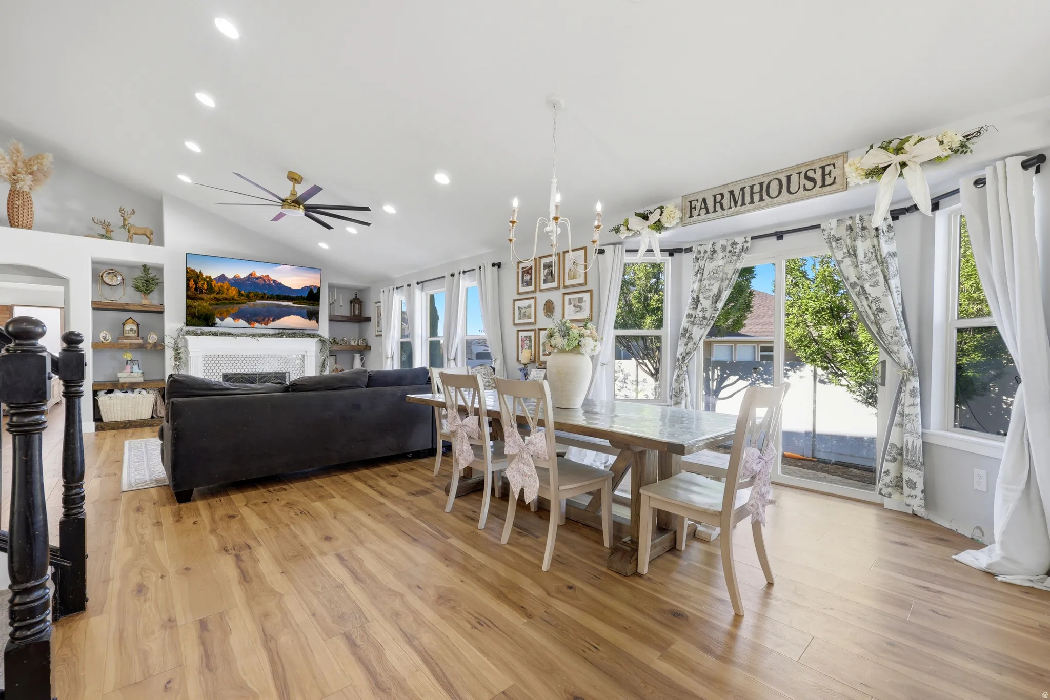 Open-concept living space with wood-finish flooring throughout
