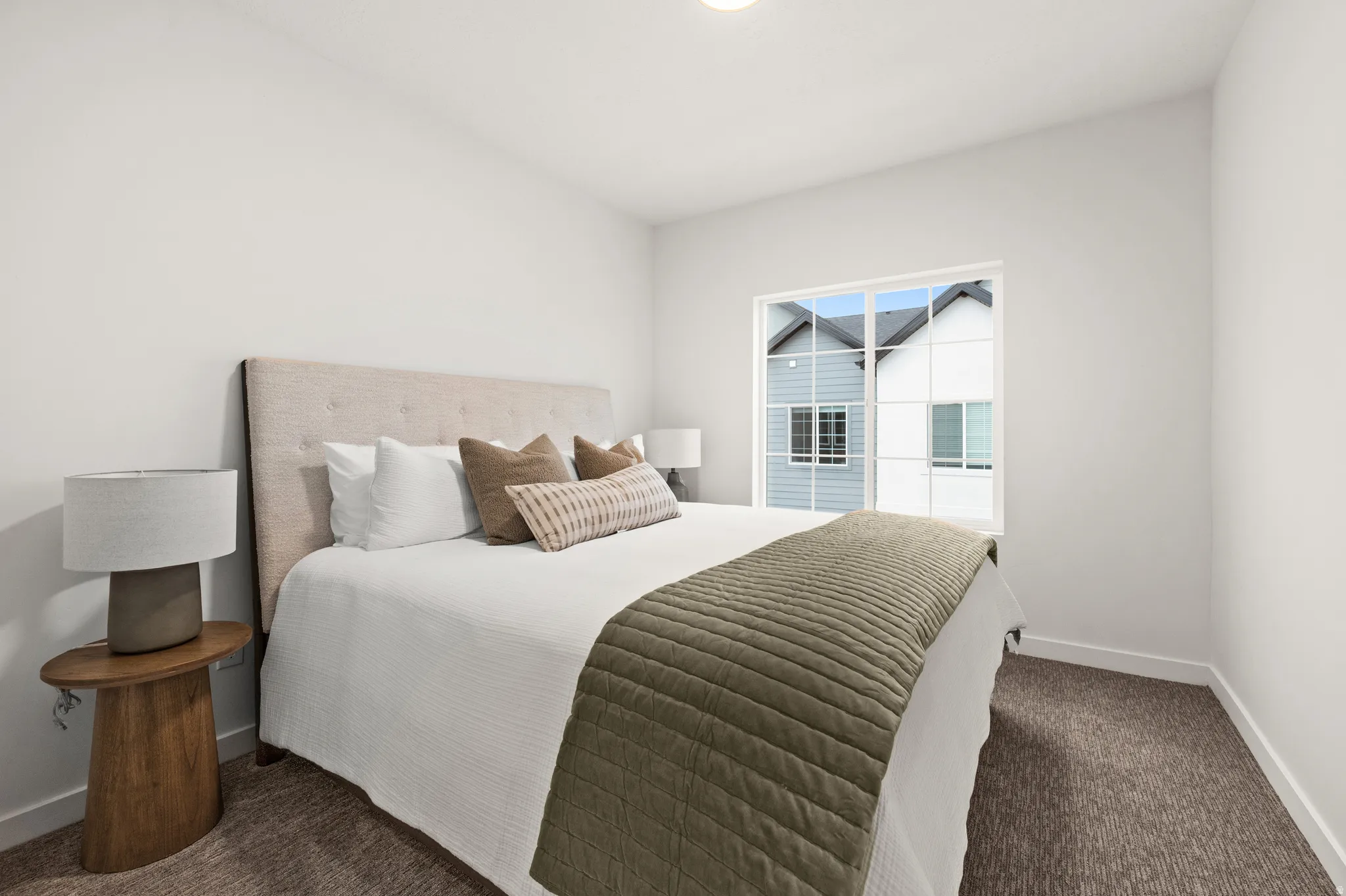 Bedroom featuring a large window, neutral paint, recessed lighting, and carpet flooring
