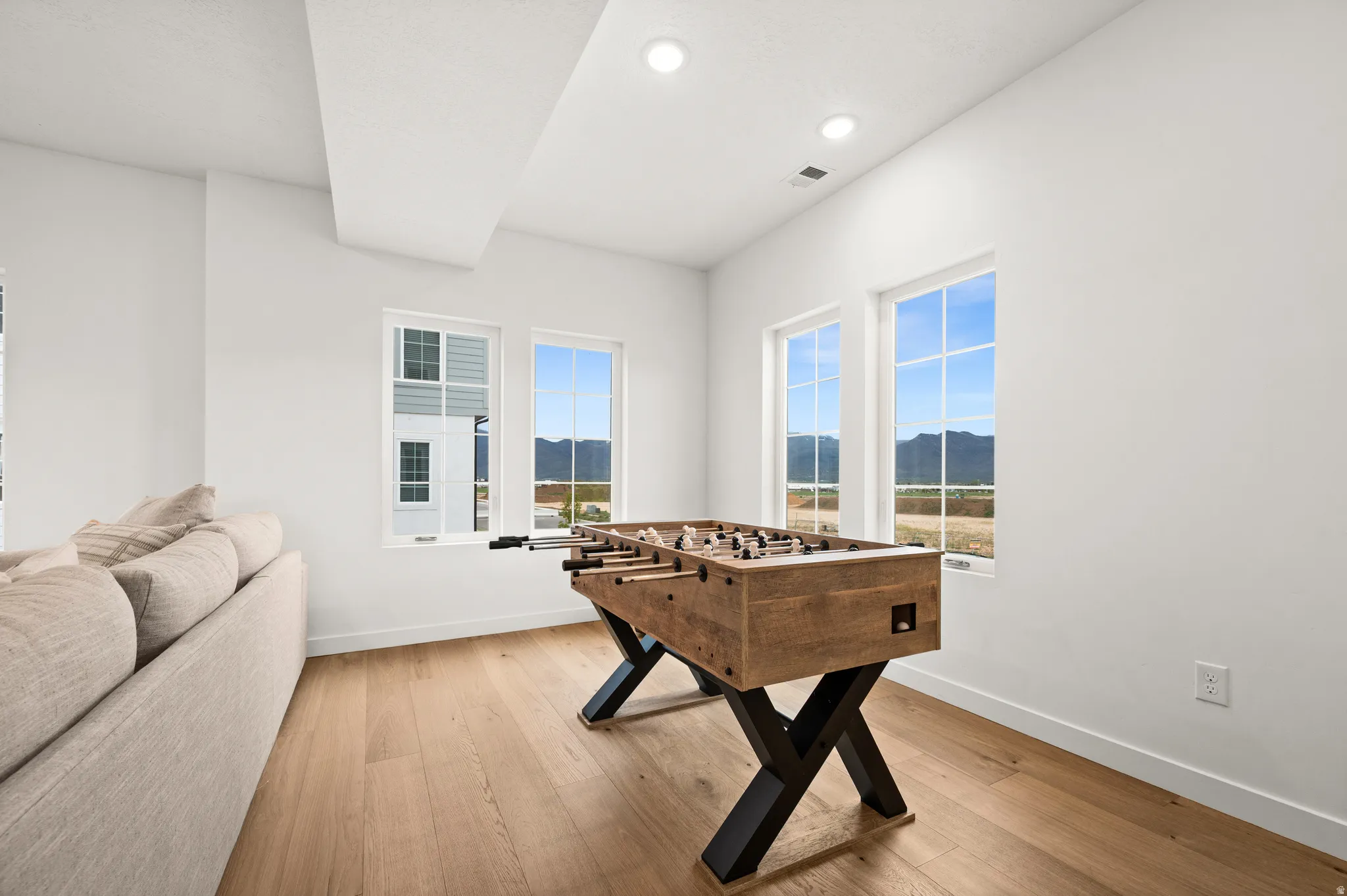 Bright interior space featuring multiple windows