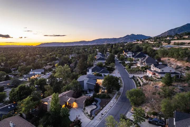 Residential neighborhood featuring varied architectural styles and mature landscaping